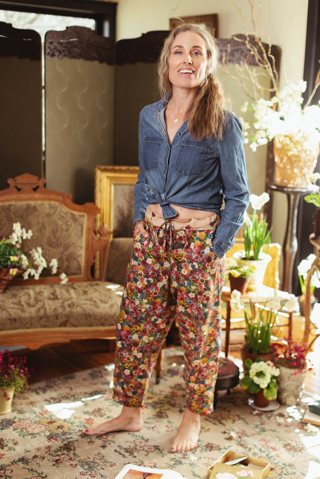 Artist pants featuring a whimsical print of 50 antique seed catalogue flowers arranged on a painter’s palette with a Monet quote – Market of Stars.