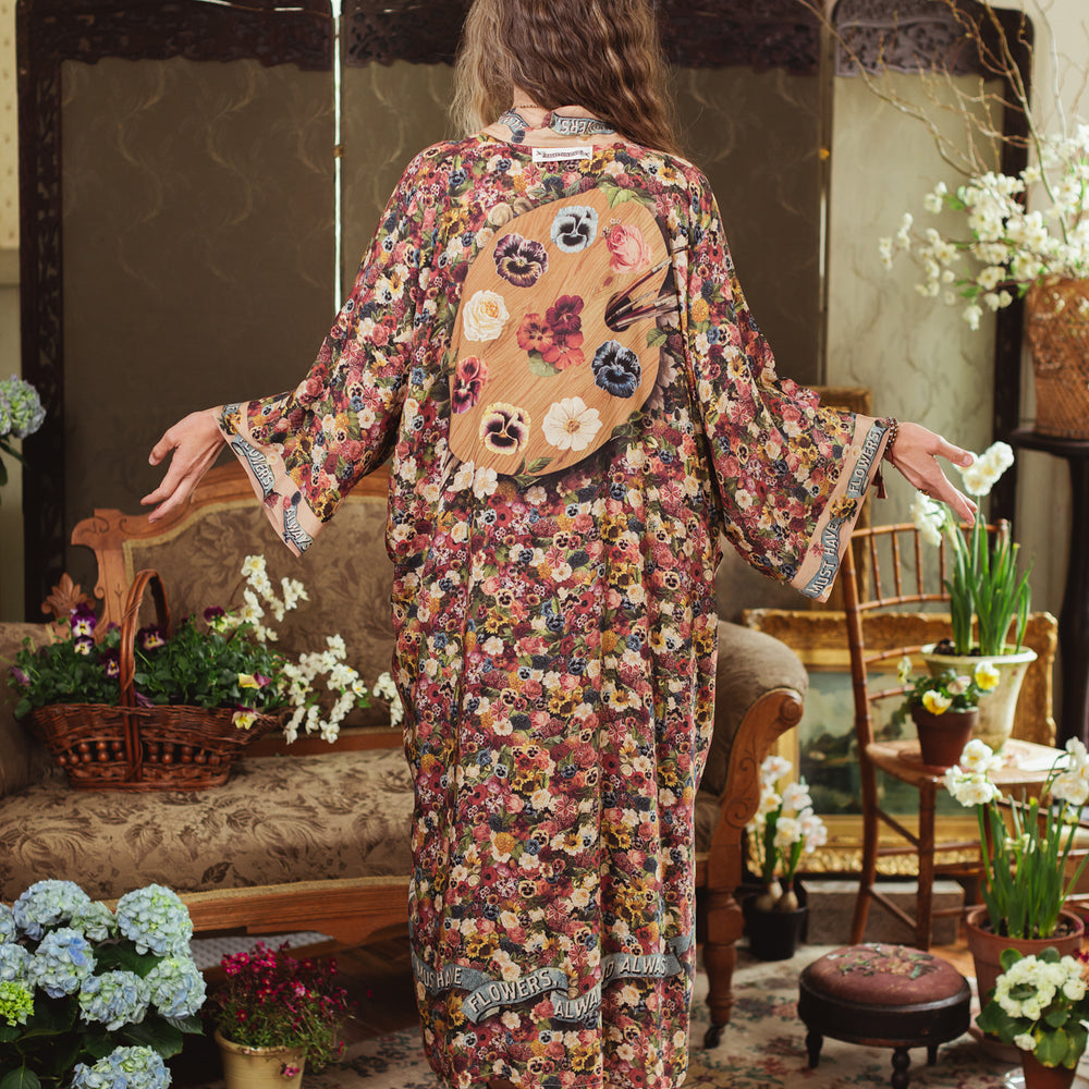 
                  
                    Opera-length kimono featuring an artist’s palette with over 50 antique seed catalogue flowers, inspired by Claude Monet’s love of flowers – Market of Stars
                  
                