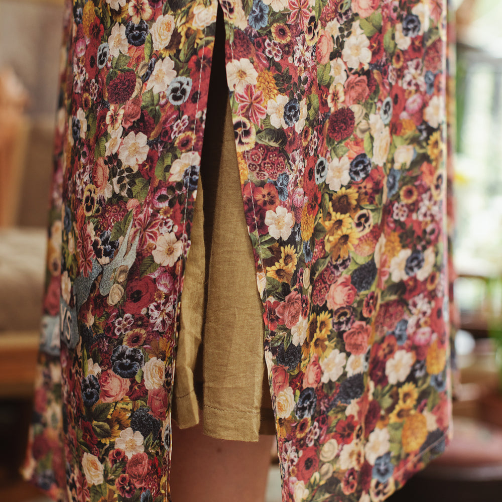 
                  
                    Opera-length kimono featuring an artist’s palette with over 50 antique seed catalogue flowers, inspired by Claude Monet’s love of flowers – Market of Stars
                  
                