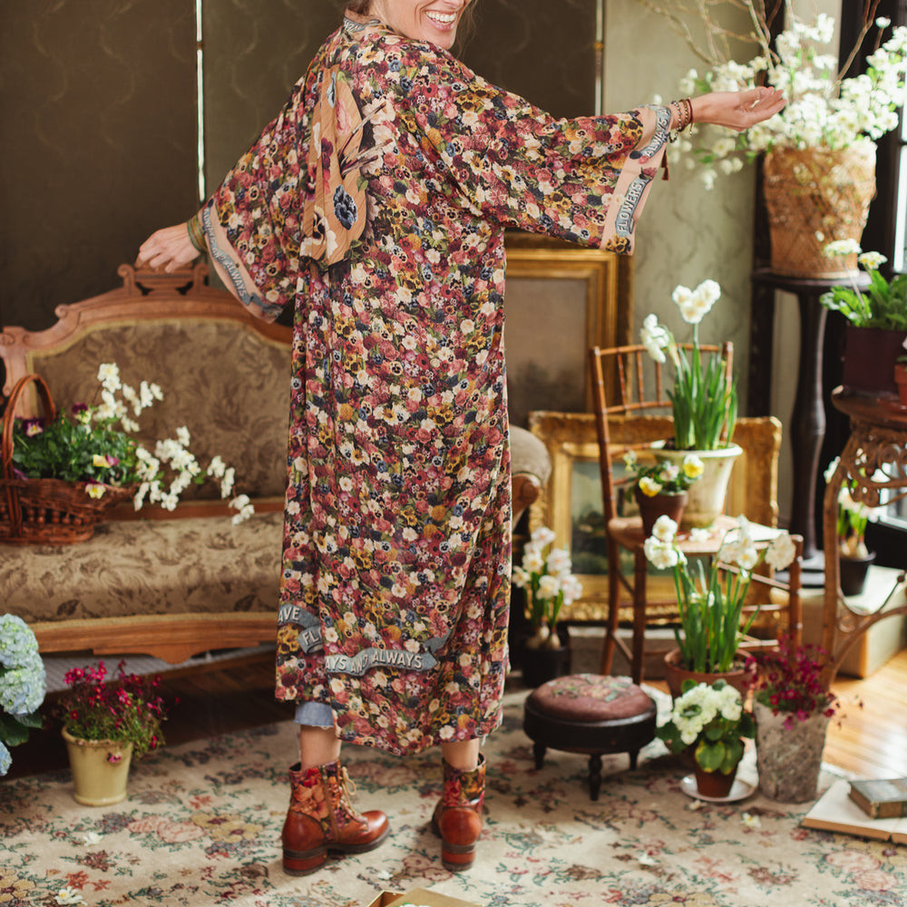 
                  
                    Opera-length kimono featuring an artist’s palette with over 50 antique seed catalogue flowers, inspired by Claude Monet’s love of flowers – Market of Stars
                  
                