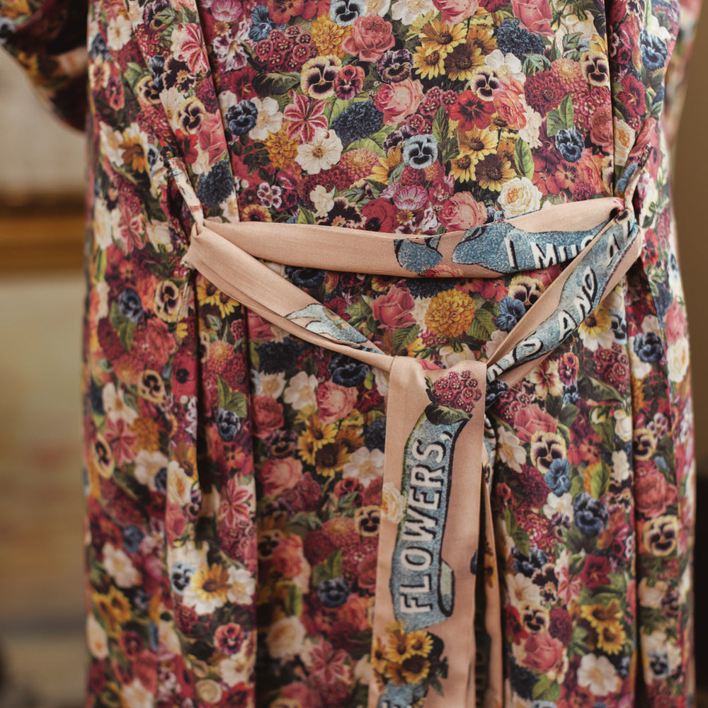 
                  
                    Opera-length kimono featuring an artist’s palette with over 50 antique seed catalogue flowers, inspired by Claude Monet’s love of flowers – Market of Stars
                  
                
