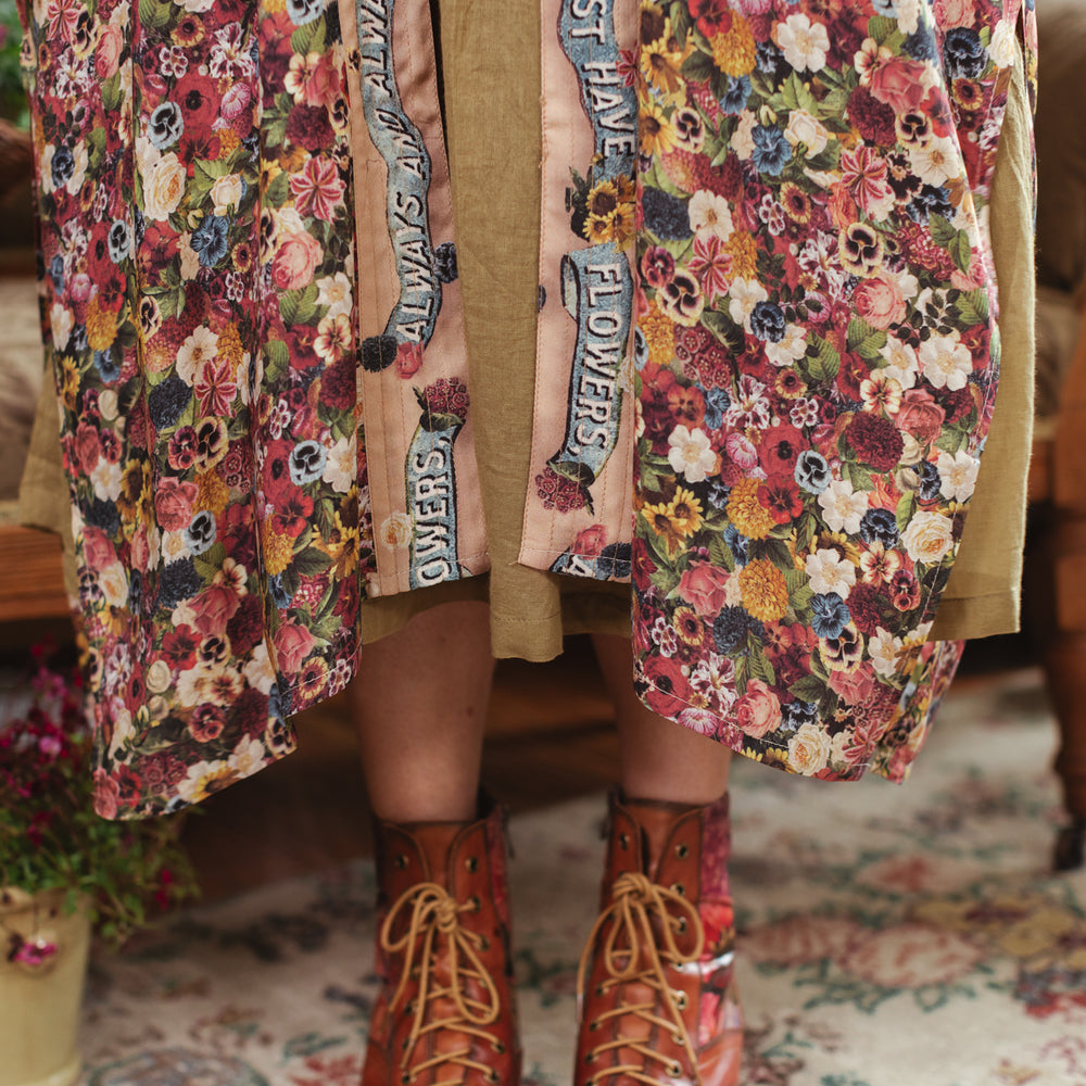 
                  
                    Opera-length kimono featuring an artist’s palette with over 50 antique seed catalogue flowers, inspired by Claude Monet’s love of flowers – Market of Stars
                  
                