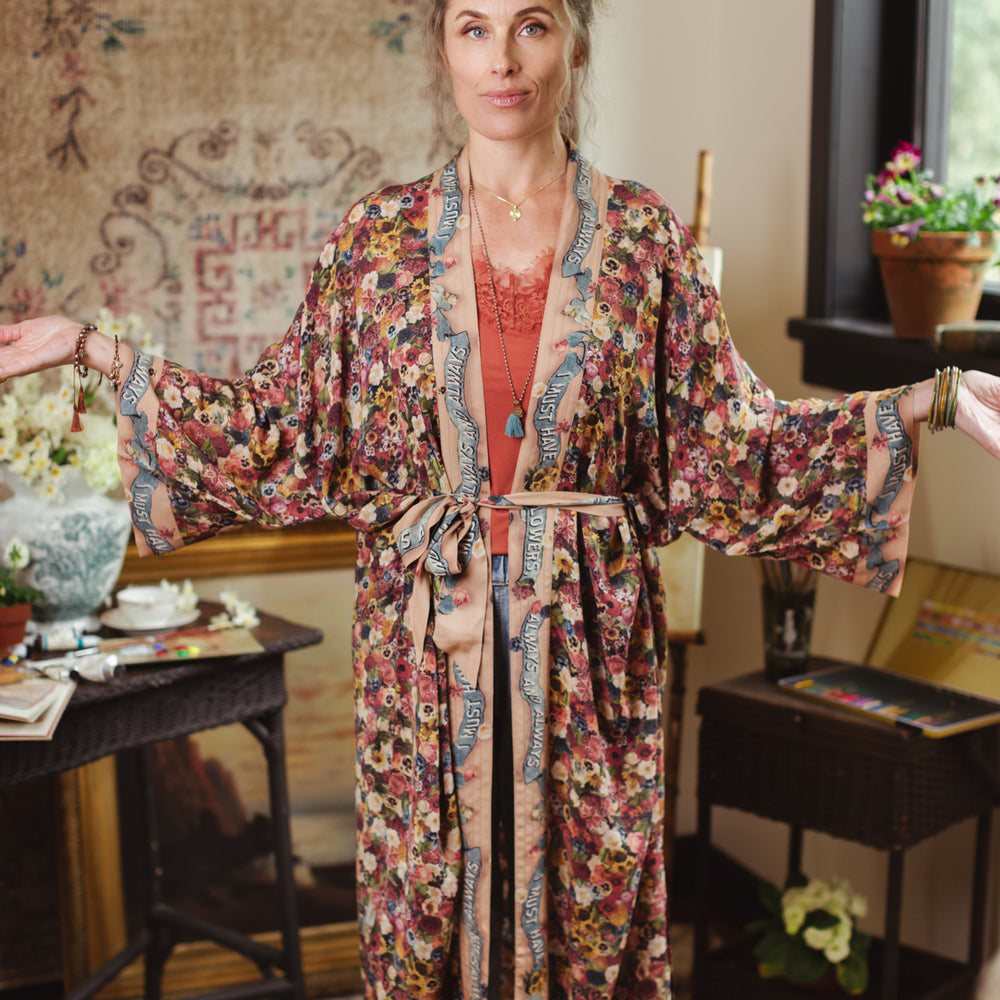 
                  
                    Opera-length kimono featuring an artist’s palette with over 50 antique seed catalogue flowers, inspired by Claude Monet’s love of flowers – Market of Stars
                  
                