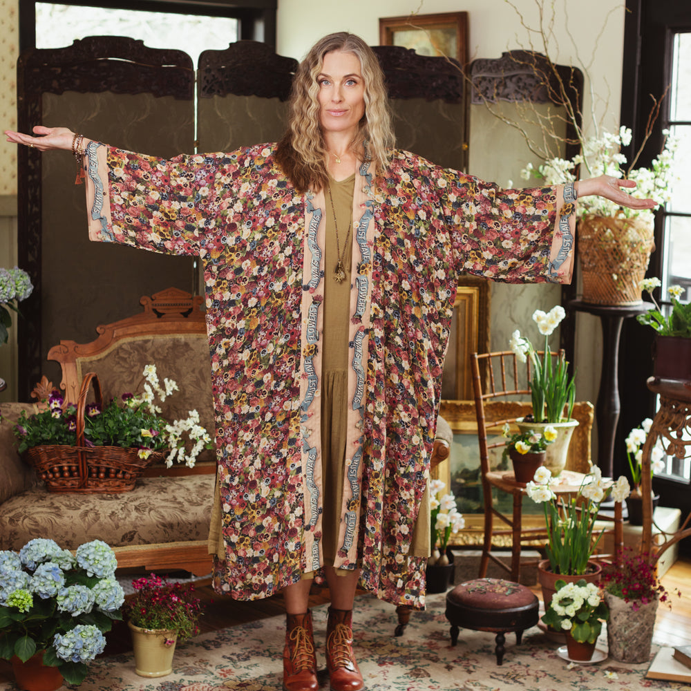 
                  
                    Opera-length kimono featuring an artist’s palette with over 50 antique seed catalogue flowers, inspired by Claude Monet’s love of flowers – Market of Stars
                  
                