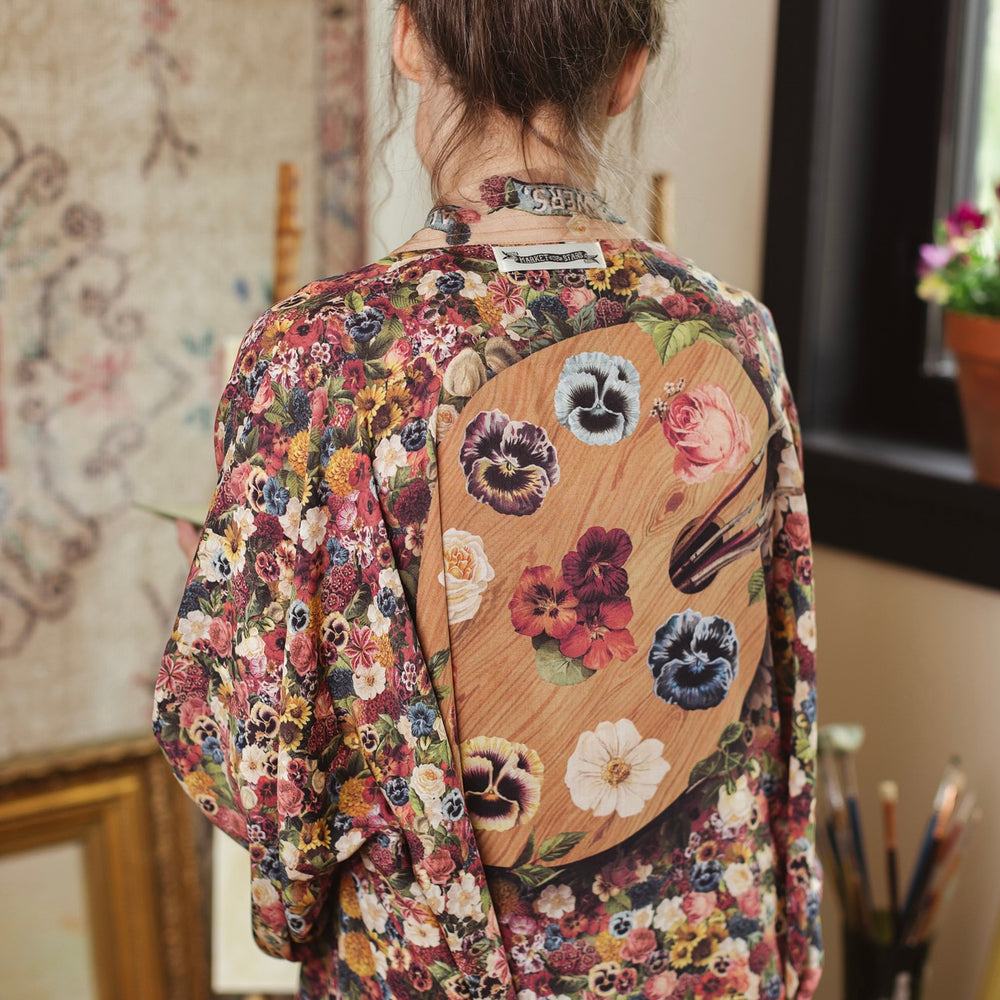 
                  
                    Opera-length kimono featuring an artist’s palette with over 50 antique seed catalogue flowers, inspired by Claude Monet’s love of flowers – Market of Stars
                  
                