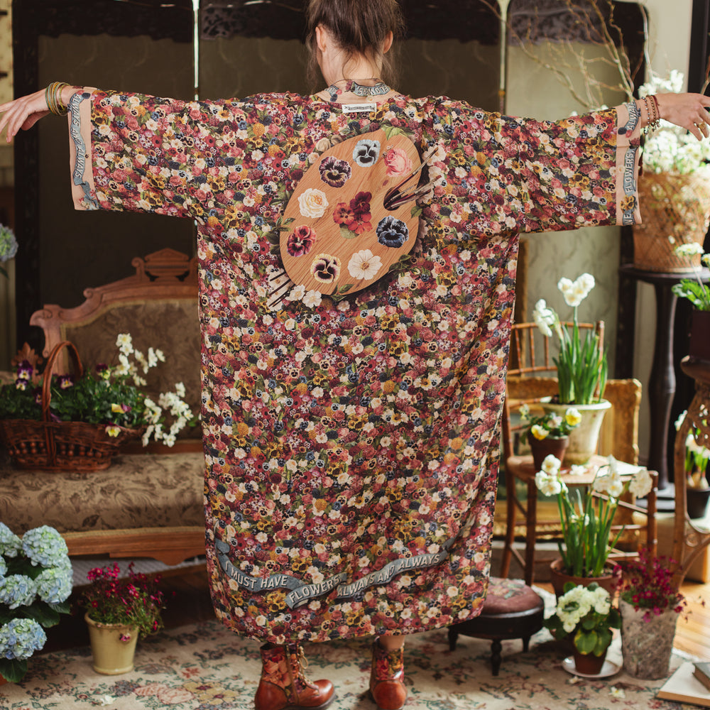 
                  
                    Opera-length kimono featuring an artist’s palette with over 50 antique seed catalogue flowers, inspired by Claude Monet’s love of flowers – Market of Stars
                  
                