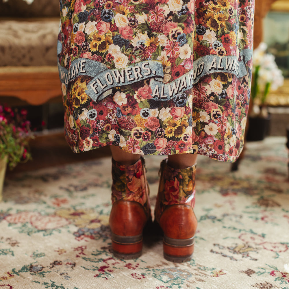
                  
                    Opera-length kimono featuring an artist’s palette with over 50 antique seed catalogue flowers, inspired by Claude Monet’s love of flowers – Market of Stars
                  
                