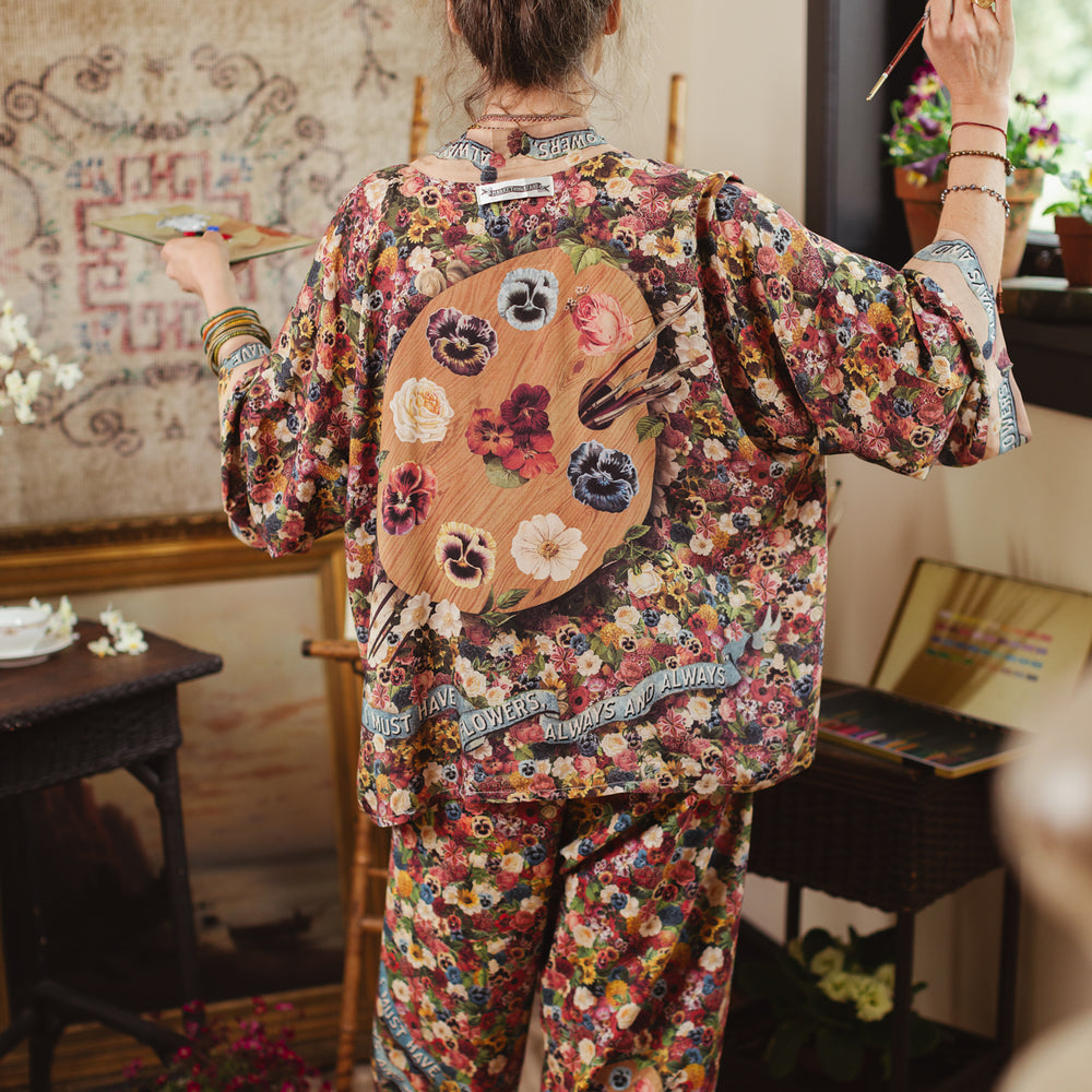 Short kimono featuring a whimsical artist’s palette and over 50 layered flowers from antique seed catalogues, inspired by Claude Monet – Market of Stars.