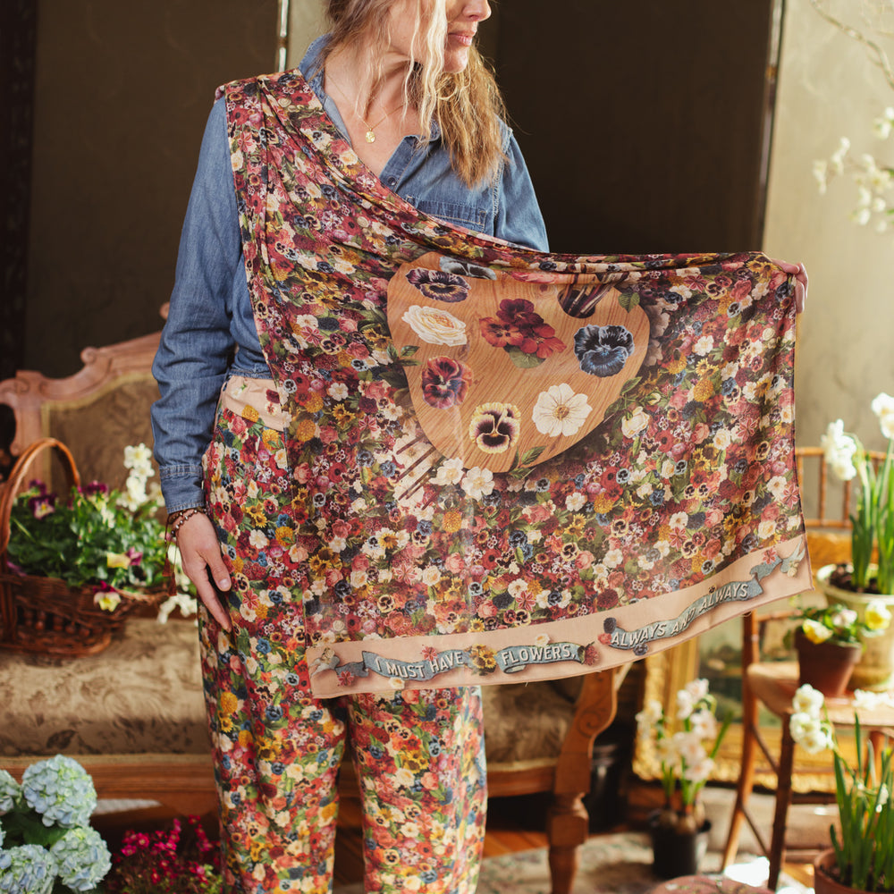 
                  
                    Soft viscose scarf featuring a vintage artist’s paint palette with floral details and over 50 layered blooms from 1800’s seed catalogues, inspired by Claude Monet – Market of Stars
                  
                