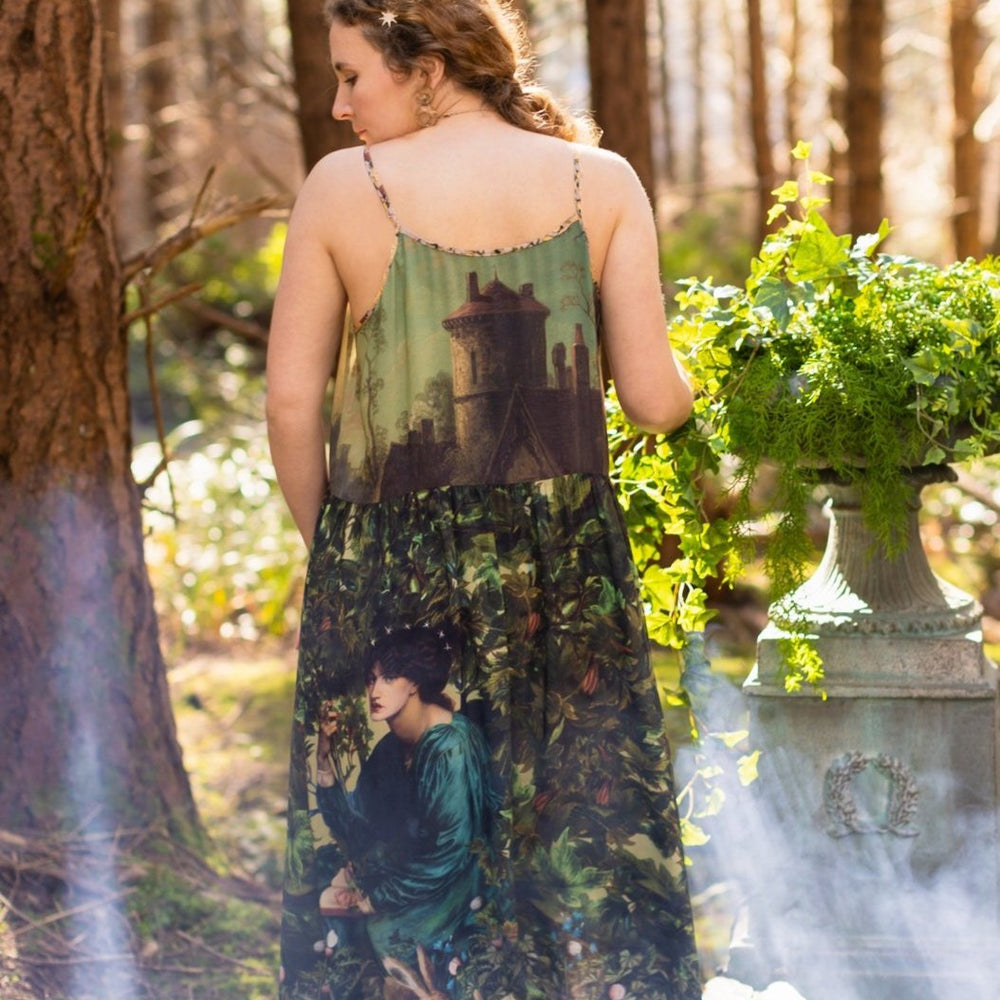 A romantic bamboo-based viscose slip dress featuring a moonlit river scene, a seated woman painted by Dante Gabriel Rossetti, and a hidden quote from a 1700s ring – Market of