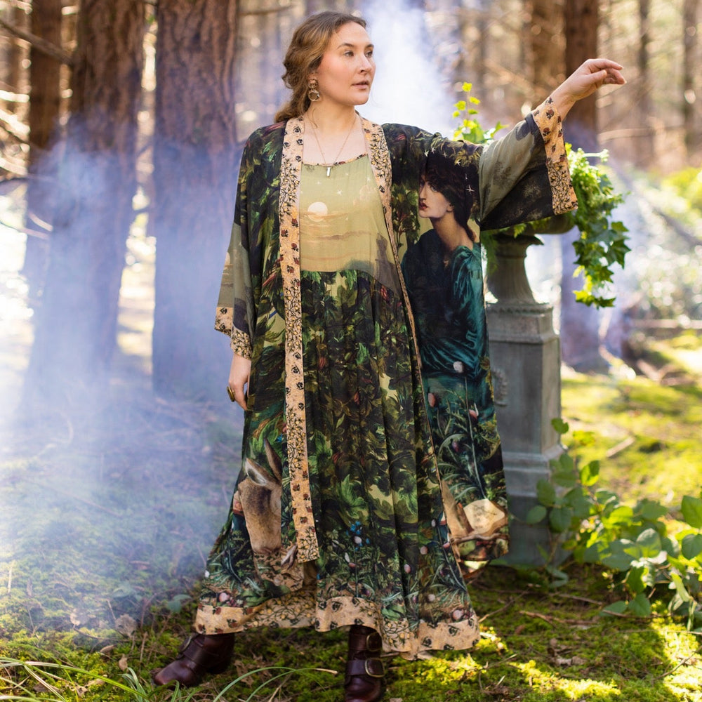 
                  
                    Romantic Bella Notte opera duster featuring Rossetti’s muse, a 16th-century rabbit, moonlit landscapes, and floral trim by William Morris – Market of Stars.
                  
                