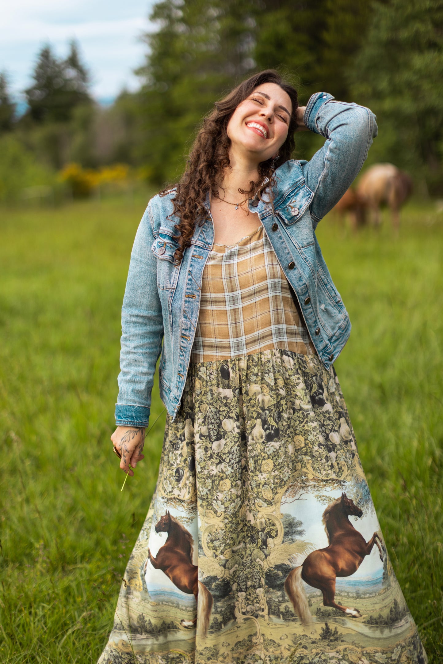 Model wearing a bamboo-viscose maxi-length slip dress made for everyday adventures with a whimsical print celebrating one's unbridled spirit of adventure - Market of Stars