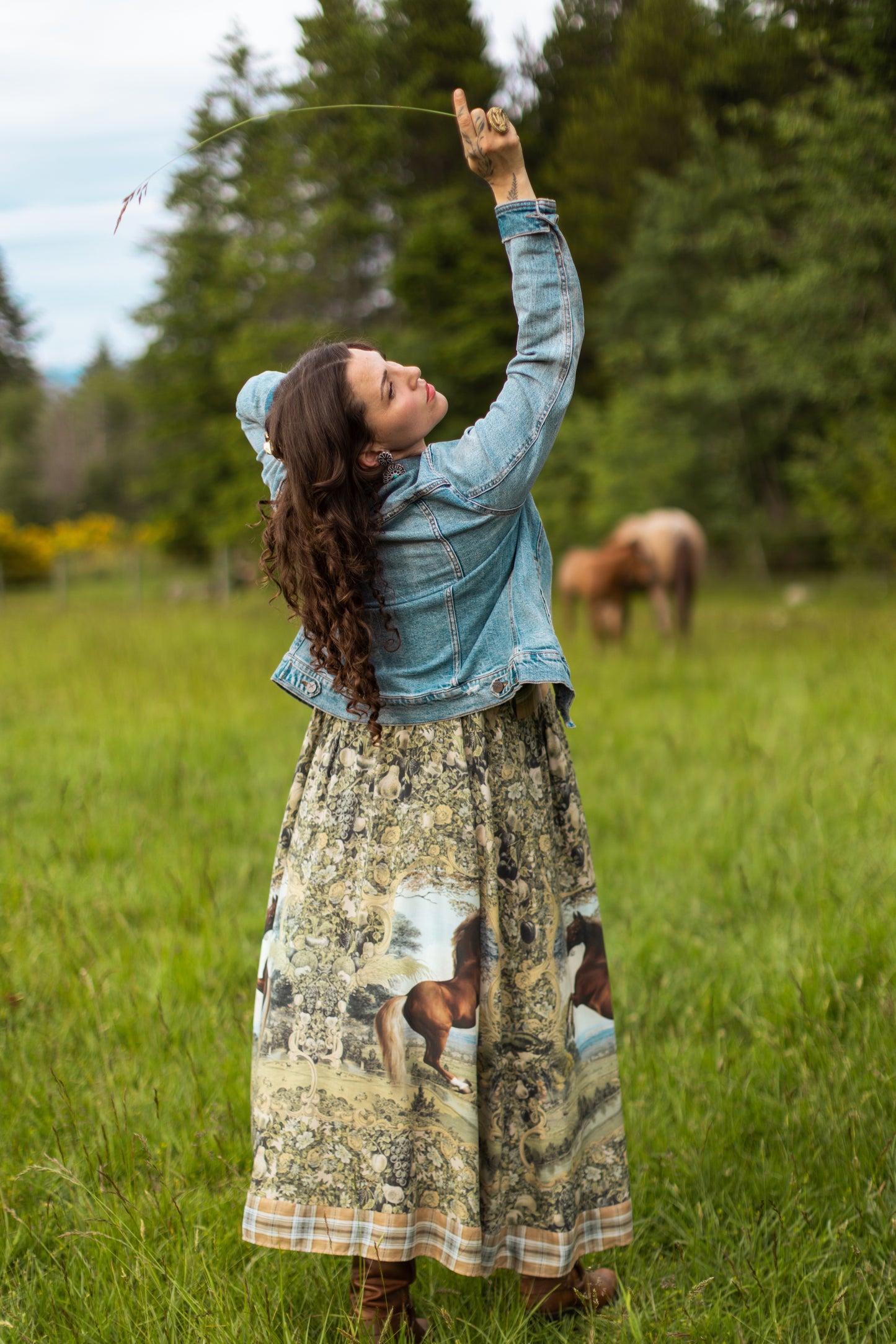 Model wearing a bamboo-viscose maxi-length slip dress made for everyday adventures with a whimsical print celebrating one's unbridled spirit of adventure - Market of Stars