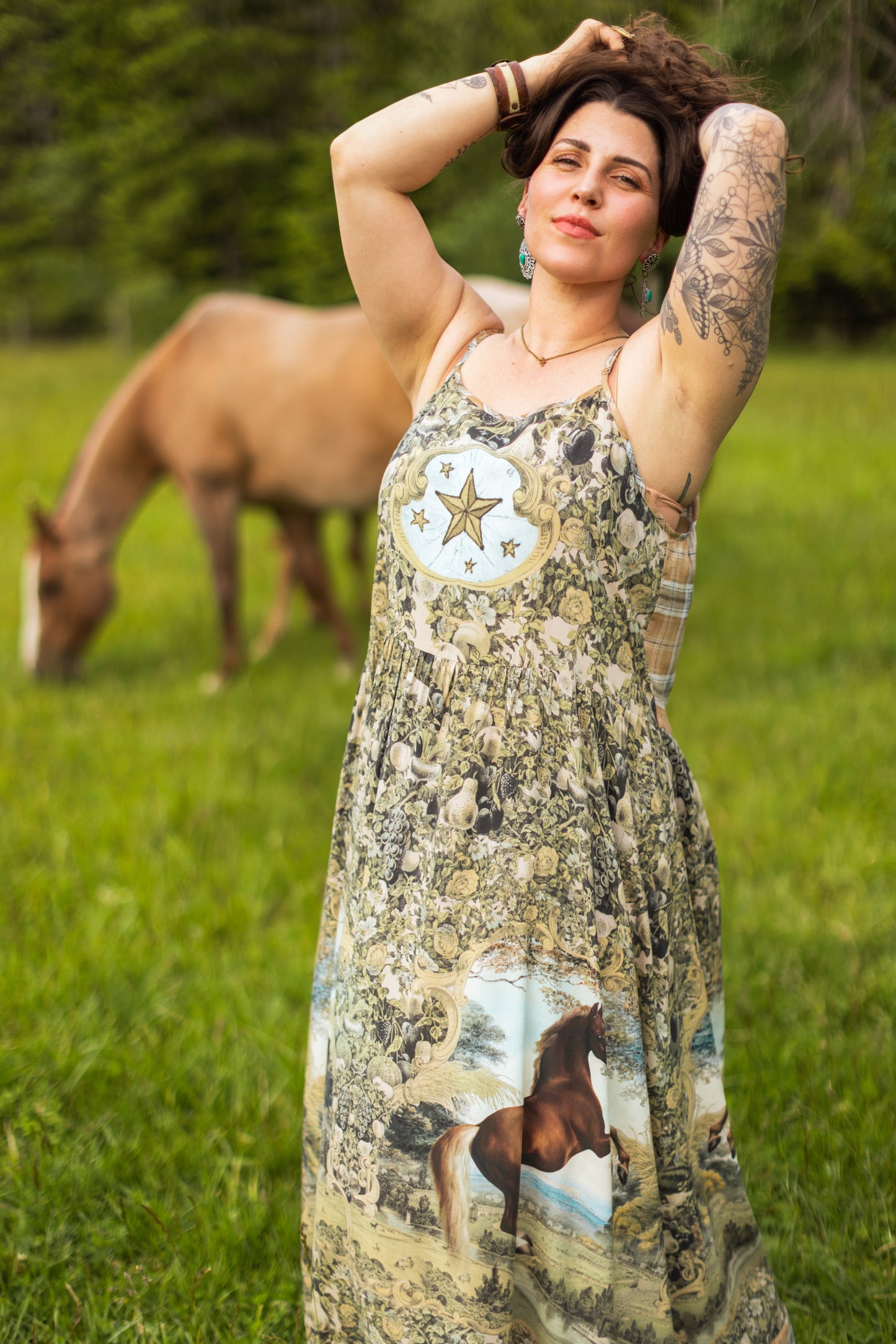 Model wearing a bamboo-viscose maxi-length slip dress made for everyday adventures with a whimsical print celebrating one's unbridled spirit of adventure - Market of Stars
