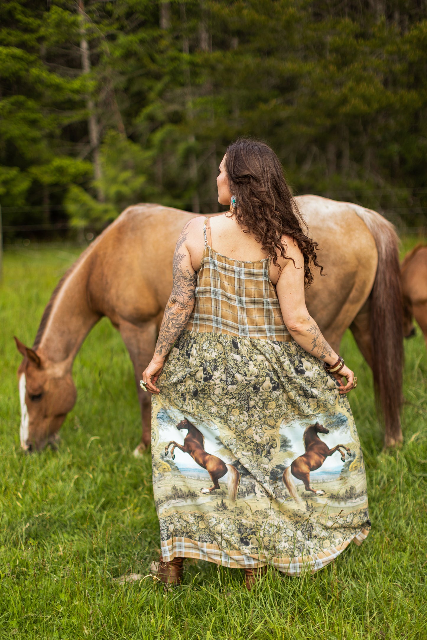 Model wearing a bamboo-viscose maxi-length slip dress made for everyday adventures with a whimsical print celebrating one's unbridled spirit of adventure - Market of Stars