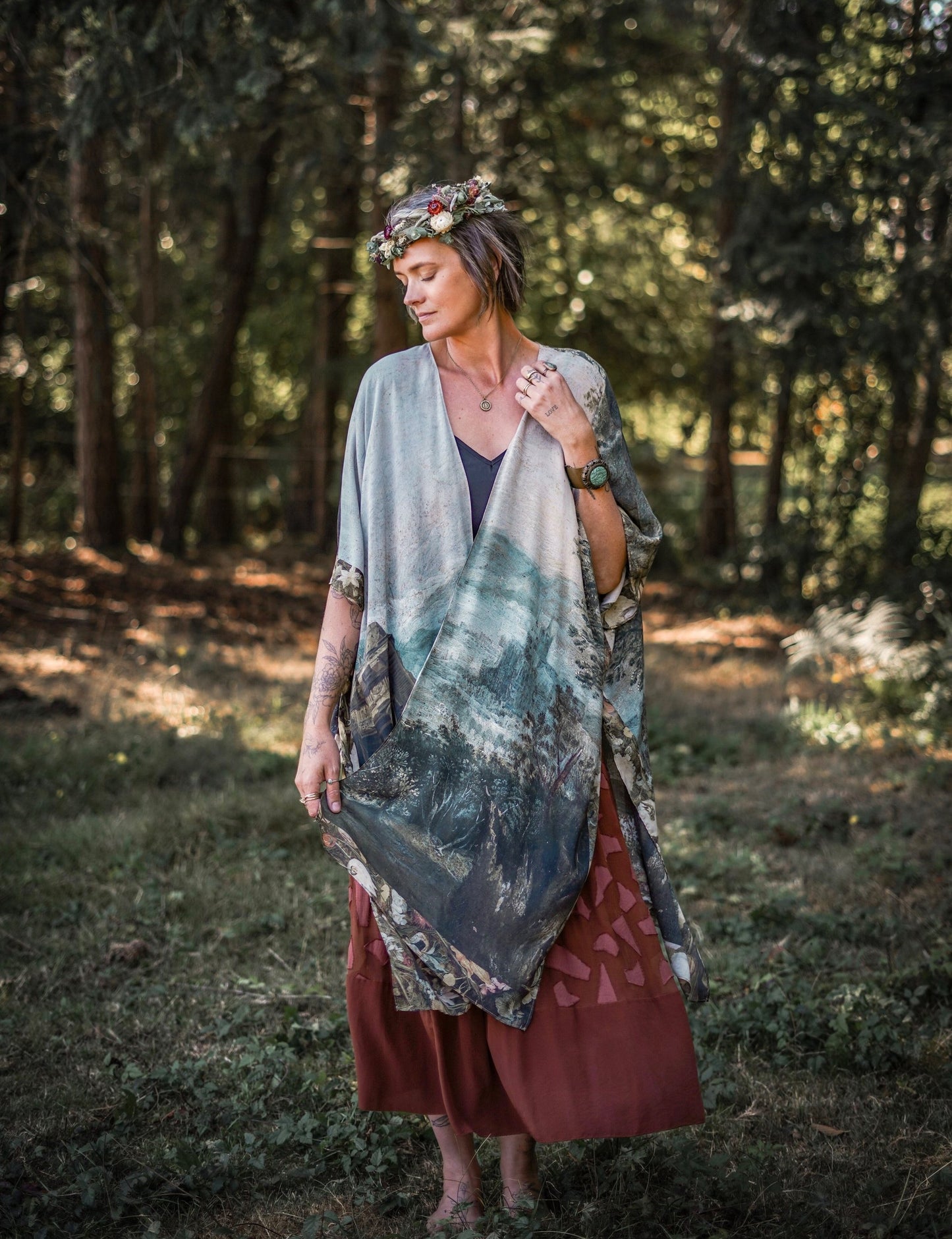 Castles in the Air Starduster kimono featuring Brueghel’s 1600s landscape, classical ruins, and joyful swing scene on bamboo-based viscose – Market of Stars.