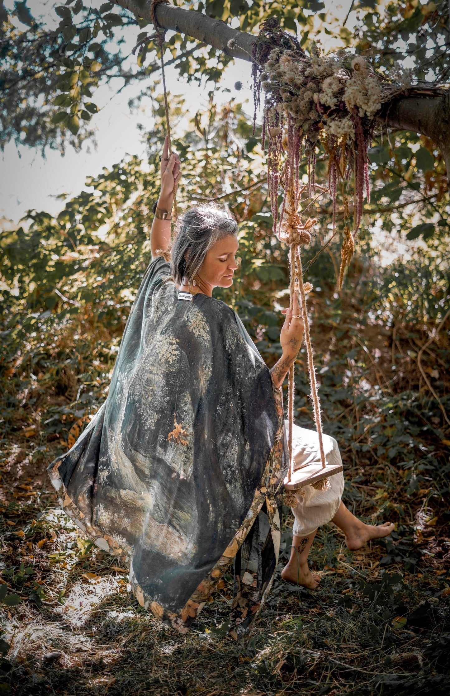 Castles in the Air Starduster kimono featuring Brueghel’s 1600s landscape, classical ruins, and joyful swing scene on bamboo-based viscose – Market of Stars.