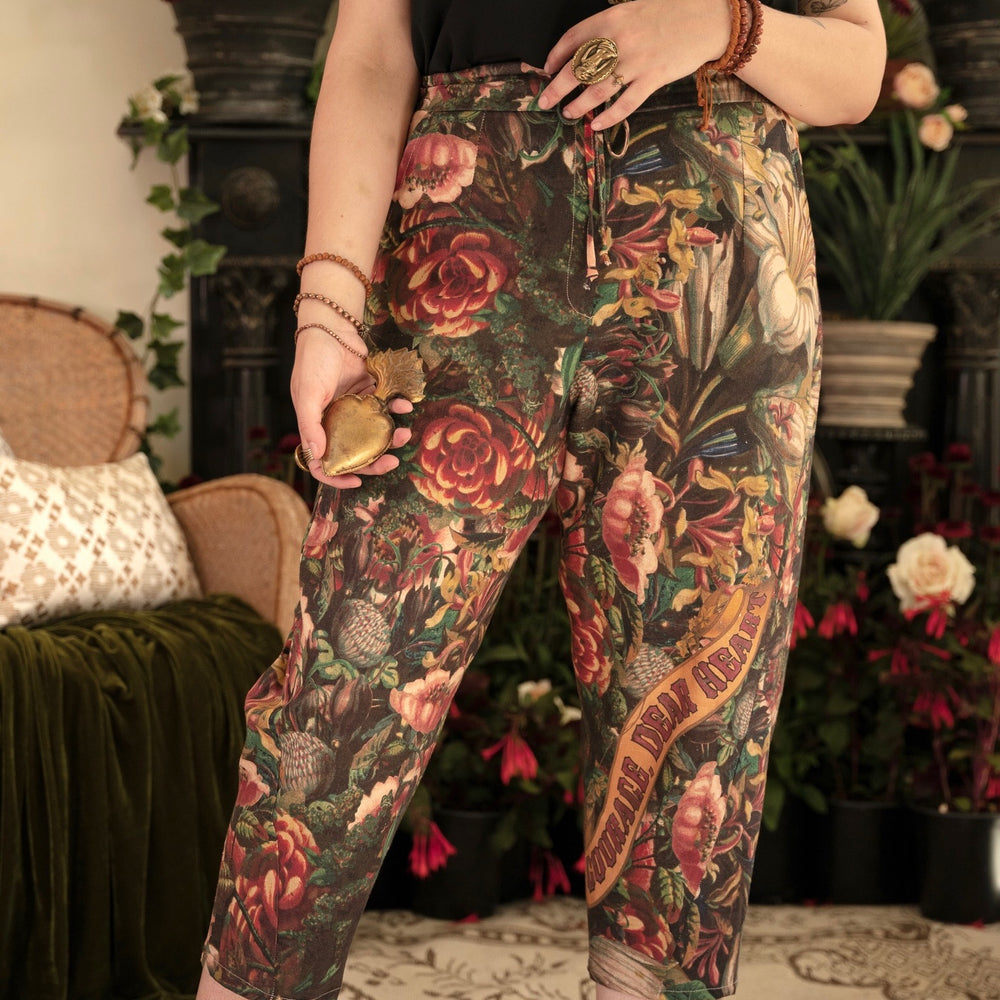 Artfully printed Courage Dear Heart Artist Pants with floral lithographs and hidden messages of love, faith, and courage in a breathable linen blend – Market of Stars.