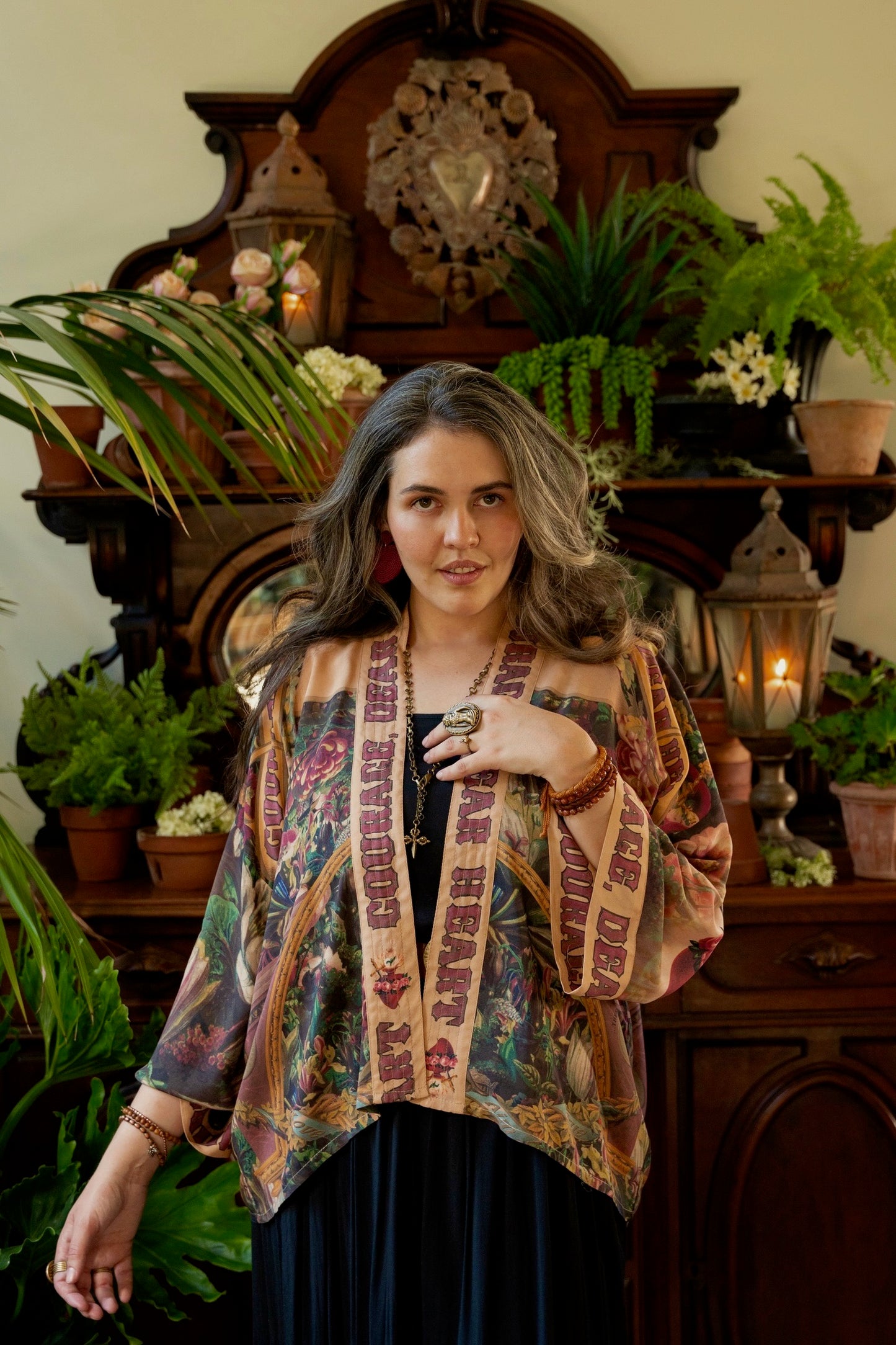 Model wearing Courage Dear Heart Pixie cut Duster featuring Victorian Sacred Heart art and hidden affirmations of courage and love on bamboo-based viscose – Market of Stars.