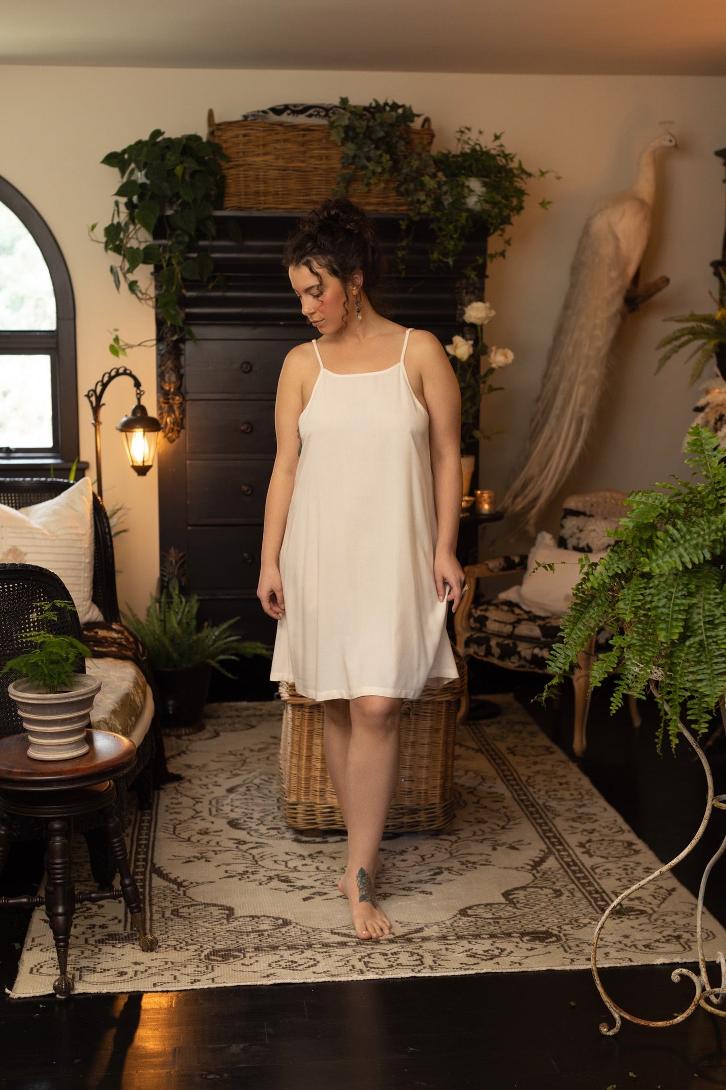 Model wearing the Étoile Simple Slip in soft natural viscose – perfect for layering under Market of Stars dresses, adding comfort and coverage – Market of Stars.