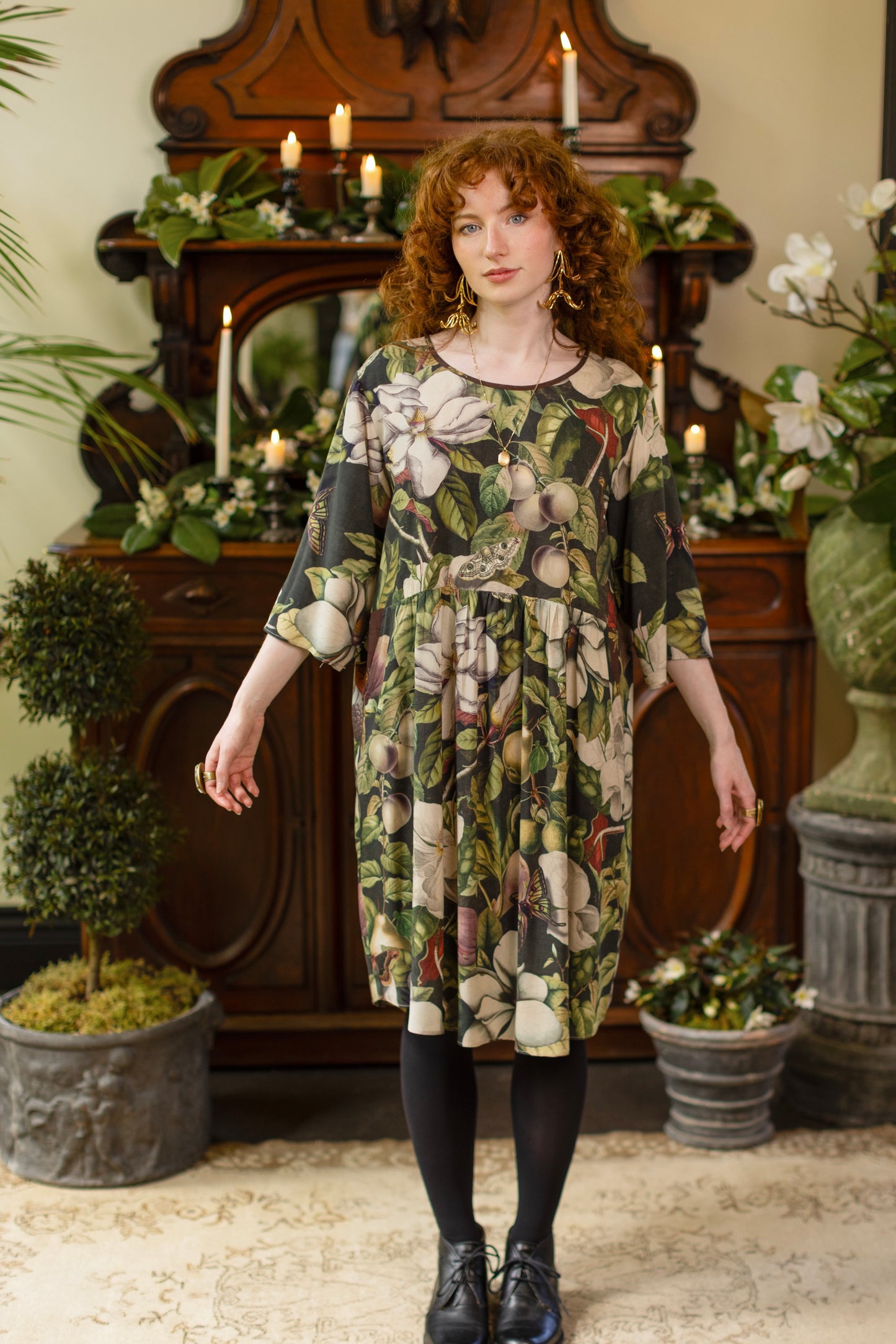 Model wearing Fleur De Lune Artist Dress featuring vintage magnolia lithographs, delicate moth etchings and bumblebee detail - inspired by the French chemise - Market of Stars
