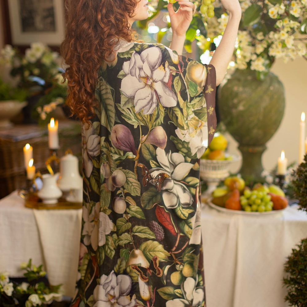 Model wearing a flowy kimono duster featuring vintage magnolia lithographs, delicate moth etchings, and charming bumblebee trim - Market of Stars