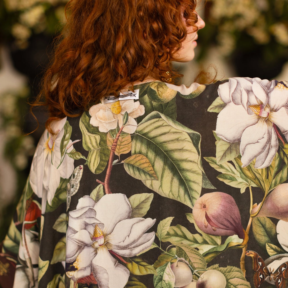 
                  
                    Model wearing a flowy kimono duster featuring vintage magnolia lithographs, delicate moth etchings, and charming bumblebee trim - Market of Stars
                  
                