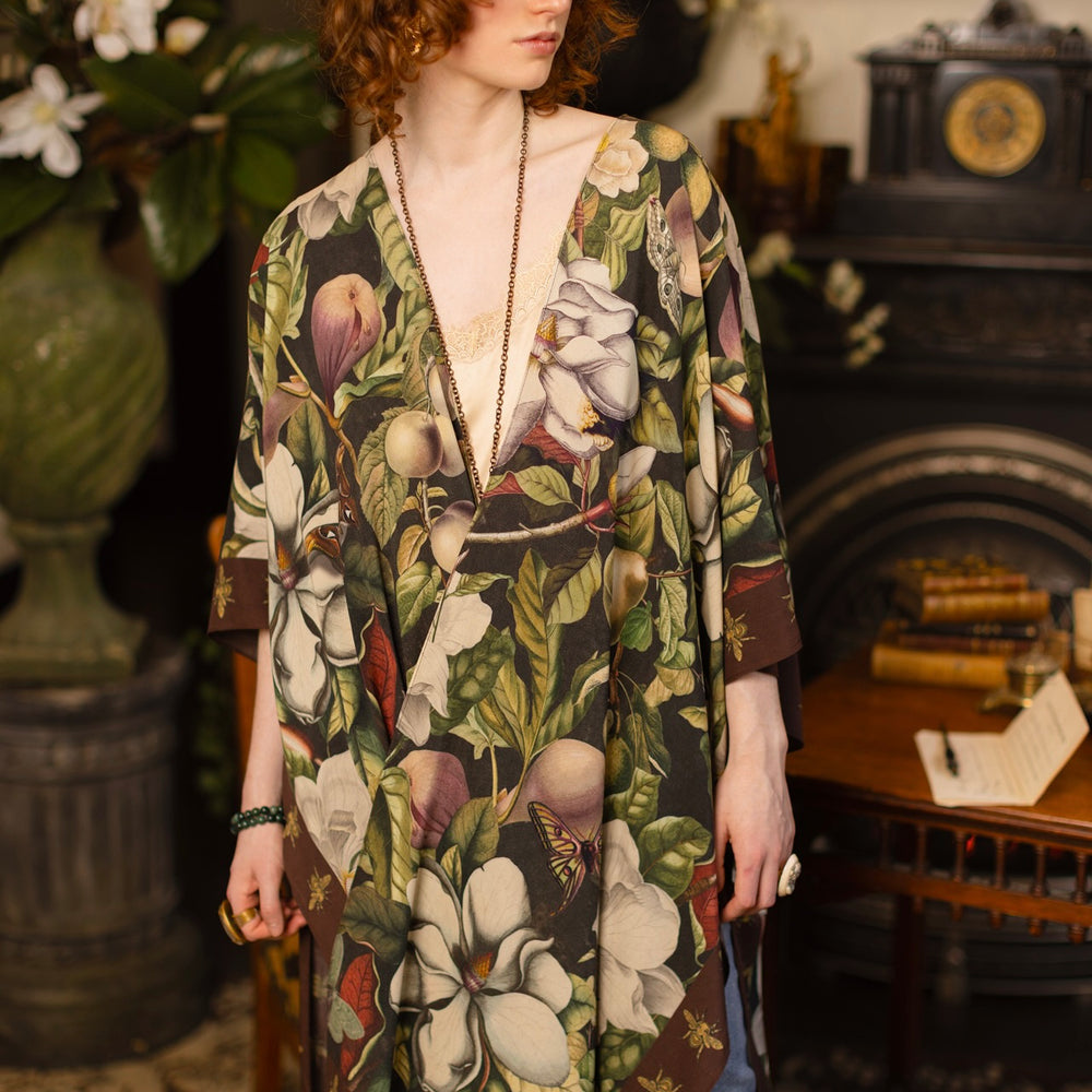 
                  
                    Model wearing a flowy kimono duster featuring vintage magnolia lithographs, delicate moth etchings, and charming bumblebee trim - Market of Stars
                  
                