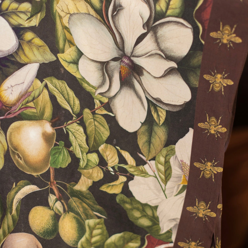 
                  
                    Model wearing a flowy kimono duster featuring vintage magnolia lithographs, delicate moth etchings, and charming bumblebee trim - Market of Stars
                  
                