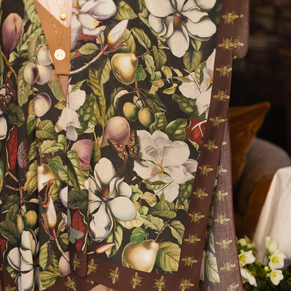
                  
                    Model wearing a flowy kimono duster featuring vintage magnolia lithographs, delicate moth etchings, and charming bumblebee trim - Market of Stars
                  
                
