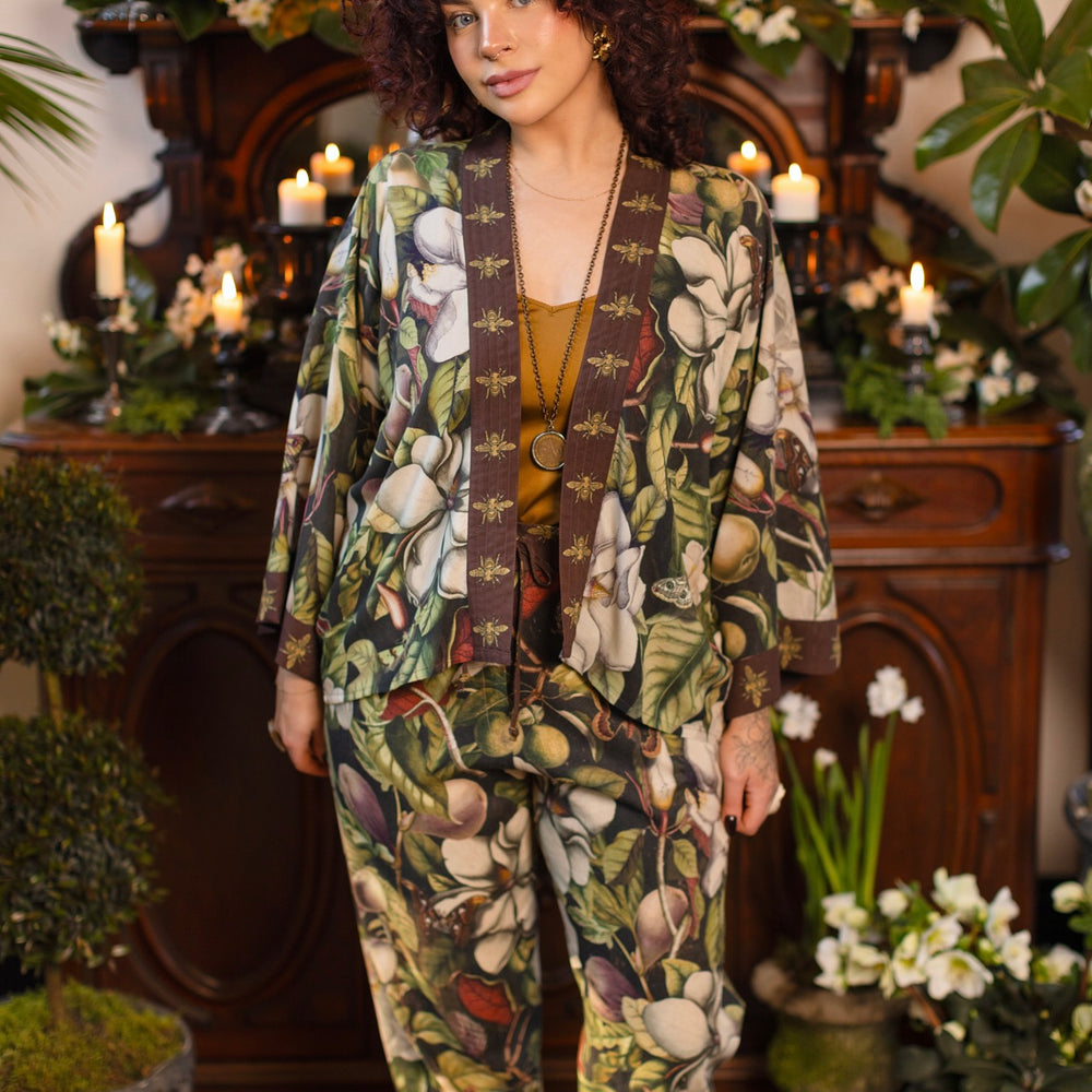 
                  
                    Model wearing a cropped kimono duster featuring vintage magnolia lithographs, delicate moth etchings, and charming bumblebee trim - Market of Stars
                  
                