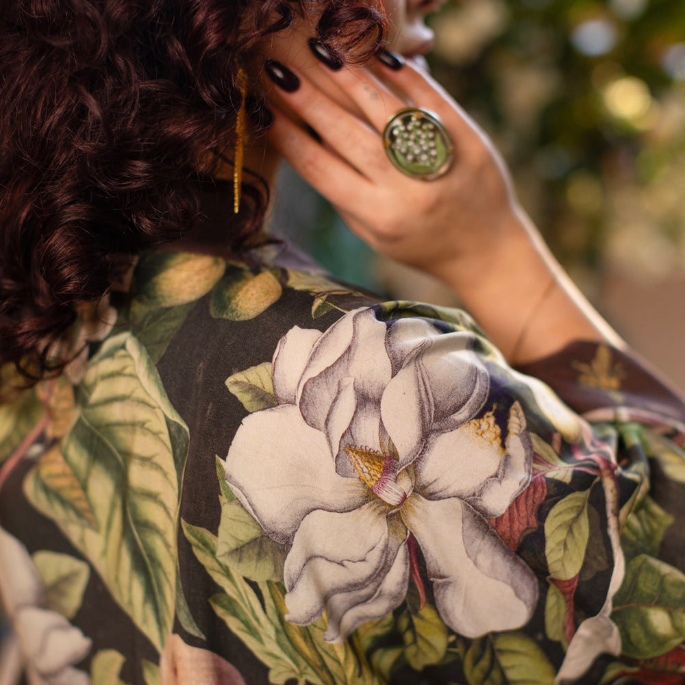 
                  
                    Model wearing a cropped kimono duster featuring vintage magnolia lithographs, delicate moth etchings, and charming bumblebee trim - Market of Stars
                  
                