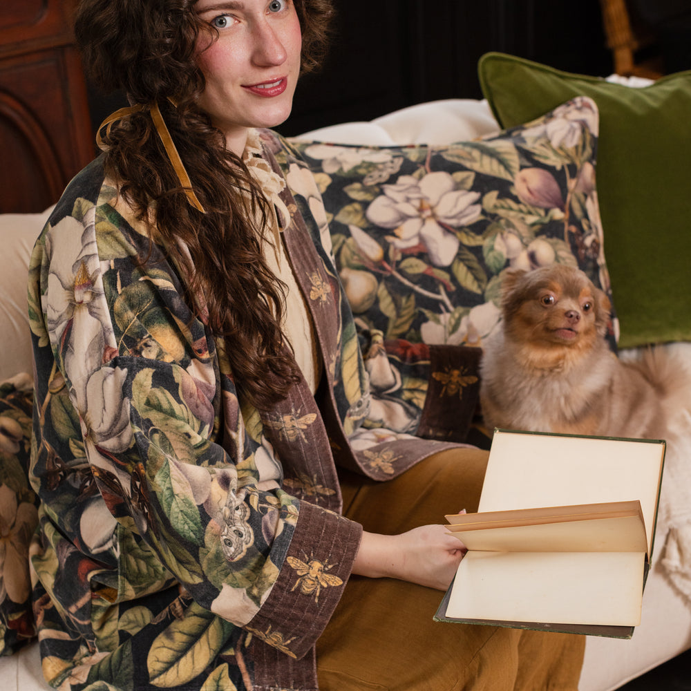 
                  
                    Model wearing a soft cotton velvet duster ft. vintage lithographs of magnolias & 1800's etchings of moths and pears - Market of Stars
                  
                