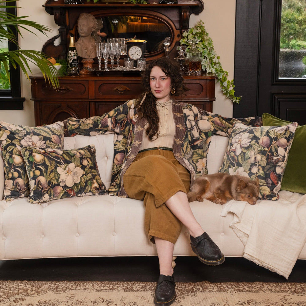 
                  
                    Model wearing a soft cotton velvet duster ft. vintage lithographs of magnolias & 1800's etchings of moths and pears - Market of Stars
                  
                
