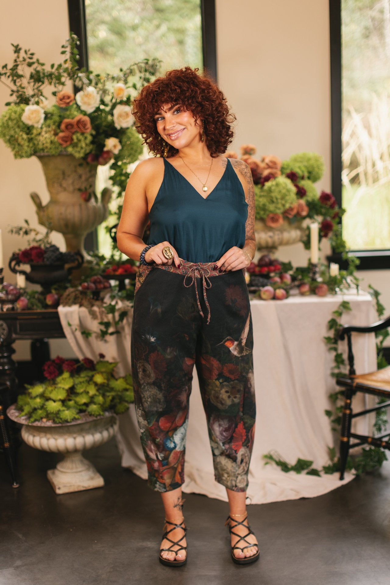Model wearing the Folklore Artist Pant featuring the Bird-of-Peace embroidery and unfinished William Morris textile designs—artful linen blend pants by Market of Stars.