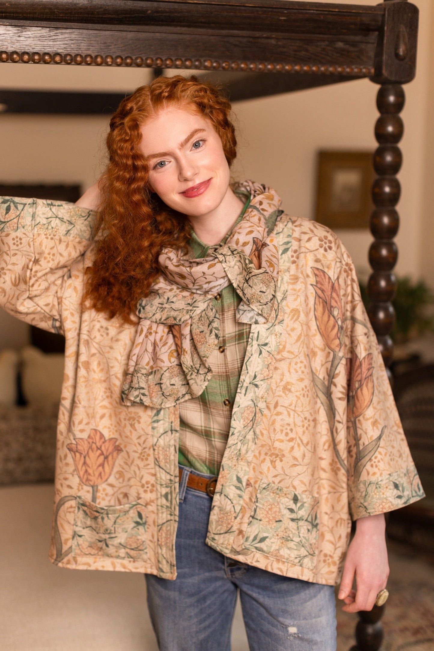 Model in cozy Folklore cottage cardigan featuring Bird-of-Peace embroidery and unfinished William Morris textile art in soft earthy tones – Market of Stars.