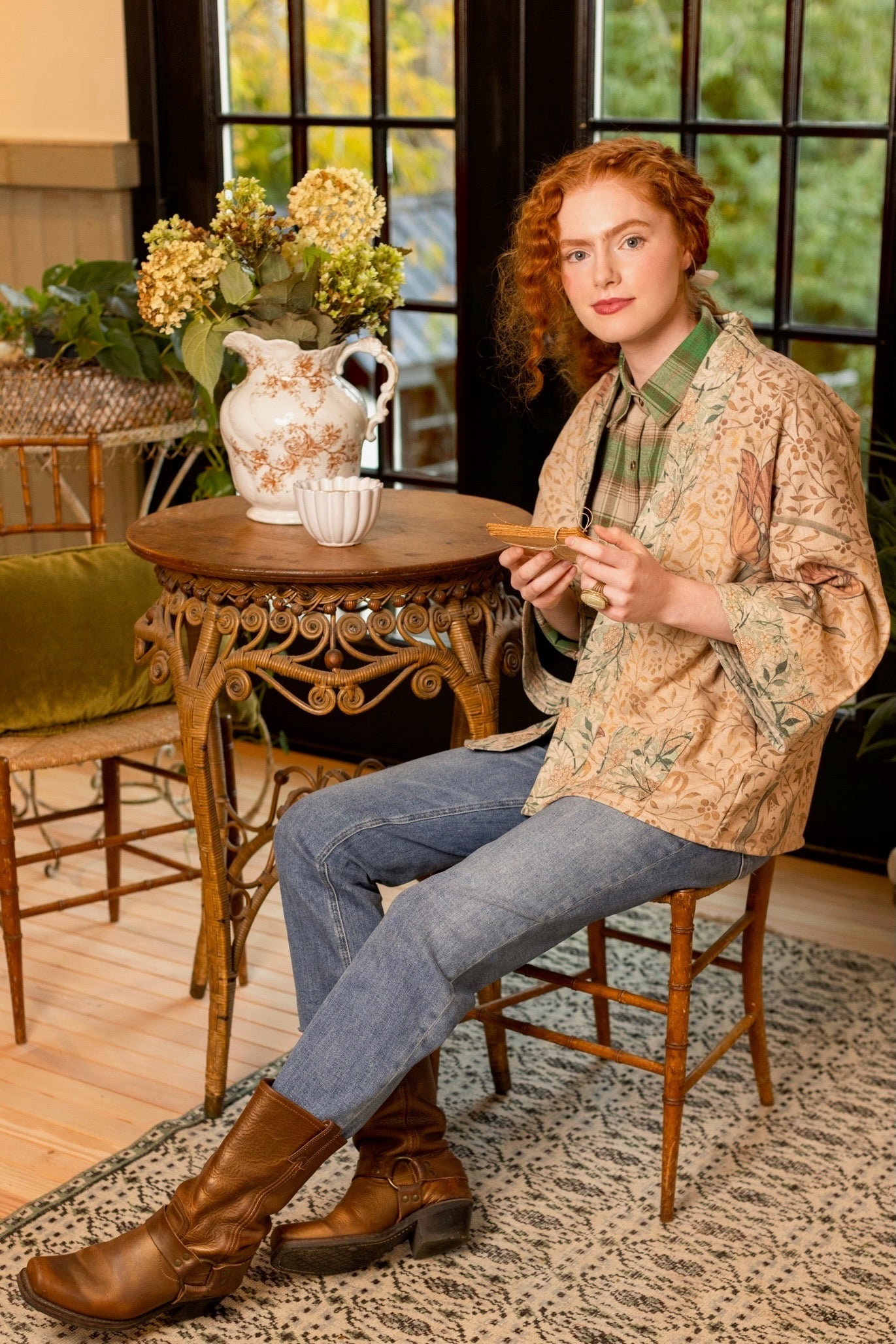 Model in cozy Folklore cottage cardigan featuring Bird-of-Peace embroidery and unfinished William Morris textile art in soft earthy tones – Market of Stars.