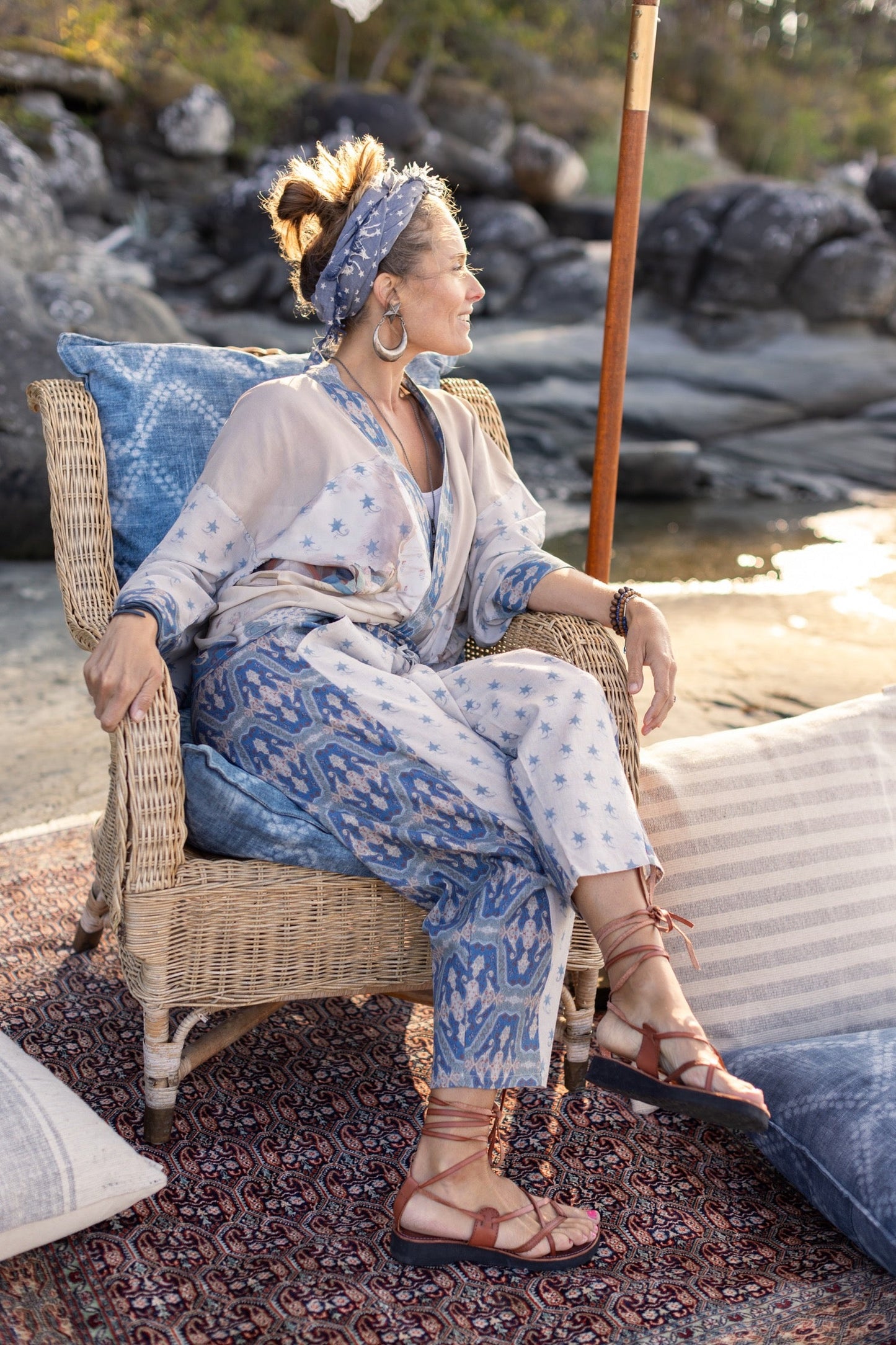 Model wearing Head in the Clouds Artist Pants featuring starry front panel and Turkish rug trim from Liotard’s portrait The Painter’s Wife-Market of Stars
