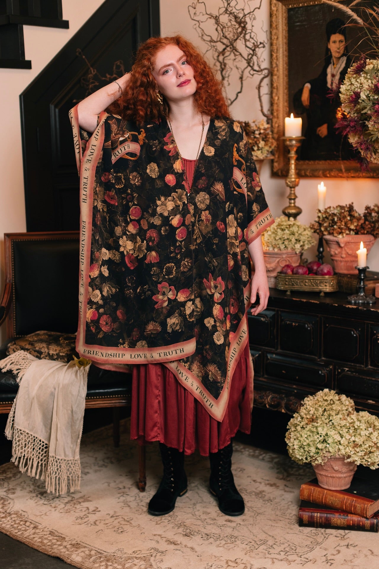 Model wearing a flowy bamboo-viscose duster featuring a collage of antique artwork with romance, loyalty, and old-world beauty - Market of Stars