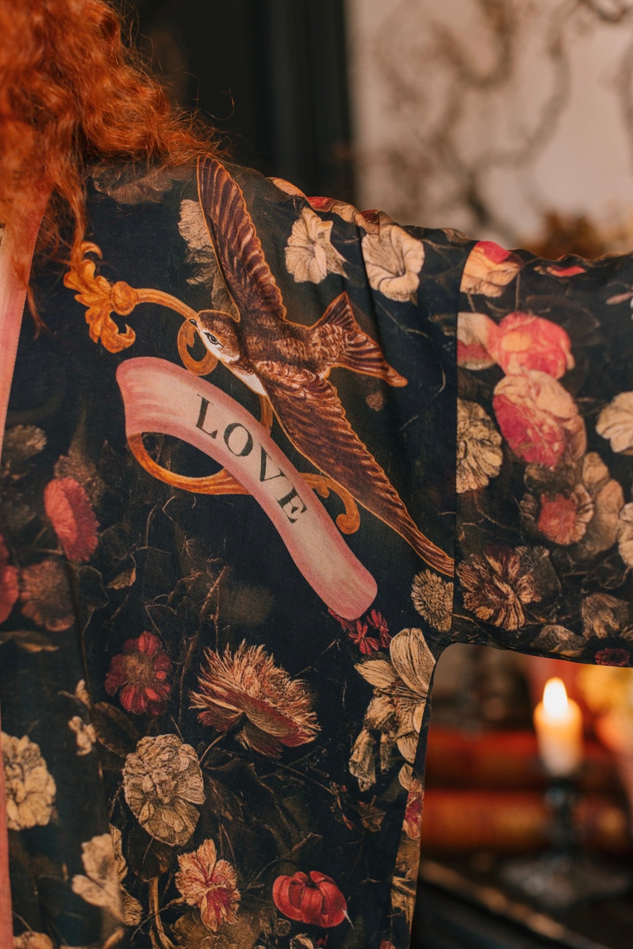 Model wearing a cropped-length bamboo-viscose duster featuring a collage of antique artwork with romance, loyalty, and old-world beauty - Market of Stars