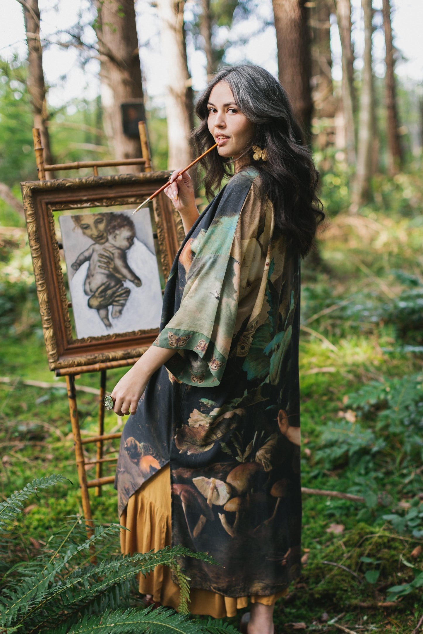 Model wearing the Heartwork Opera Duster featuring Artemisia Gentileschi’s self-portrait surrounded by forest, birds, and butterflies – Market of Stars.