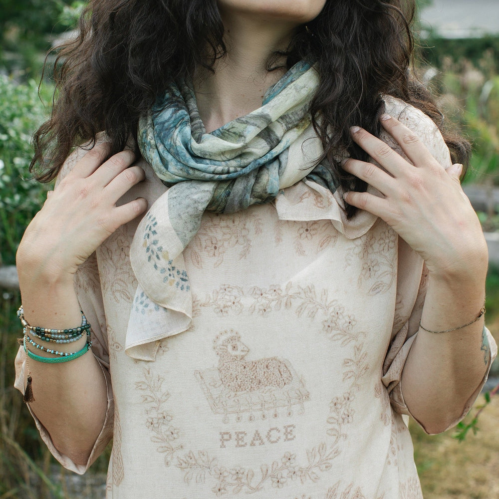 Delicate Land of Plenty scarf featuring pastoral Dutch landscapes, vintage cross-stitch details, and peaceful cottagecore vibes – Market of Stars.