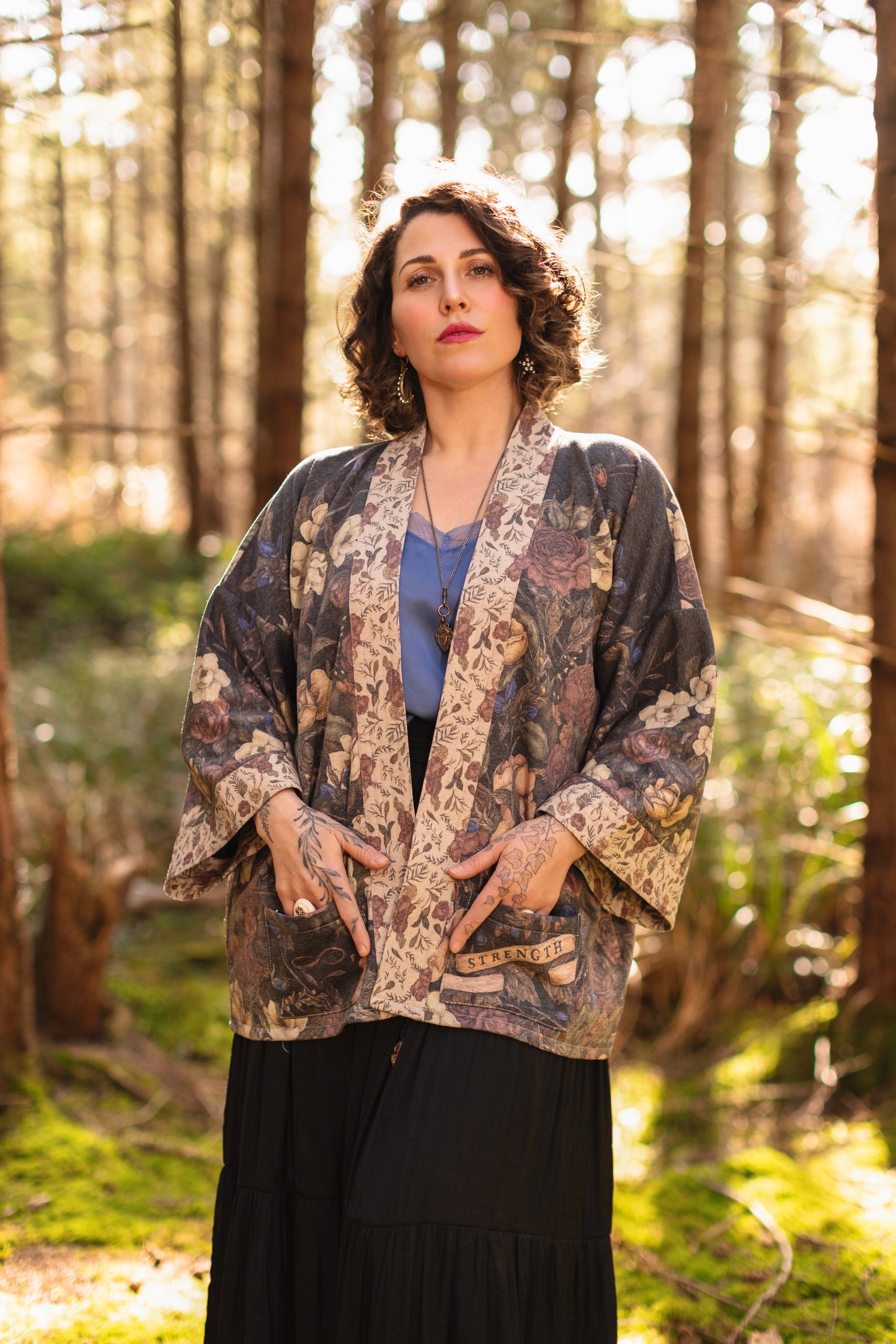 Model wearing the Lionheart Cottage Cardigan ft artwork by illustrator Jessica Roux - Market of Stars
