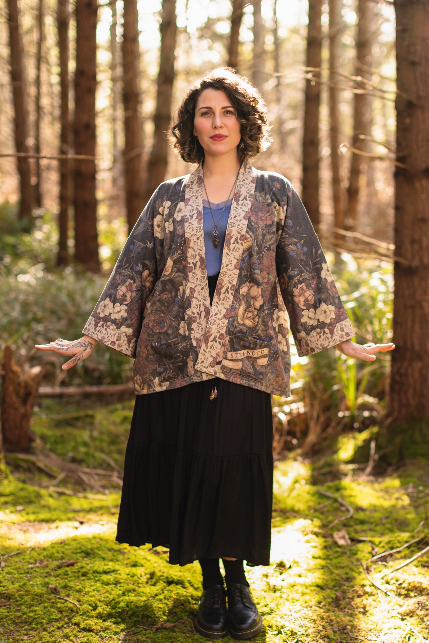 Model wearing the Lionheart Cottage Cardigan ft artwork by illustrator Jessica Roux - Market of Stars