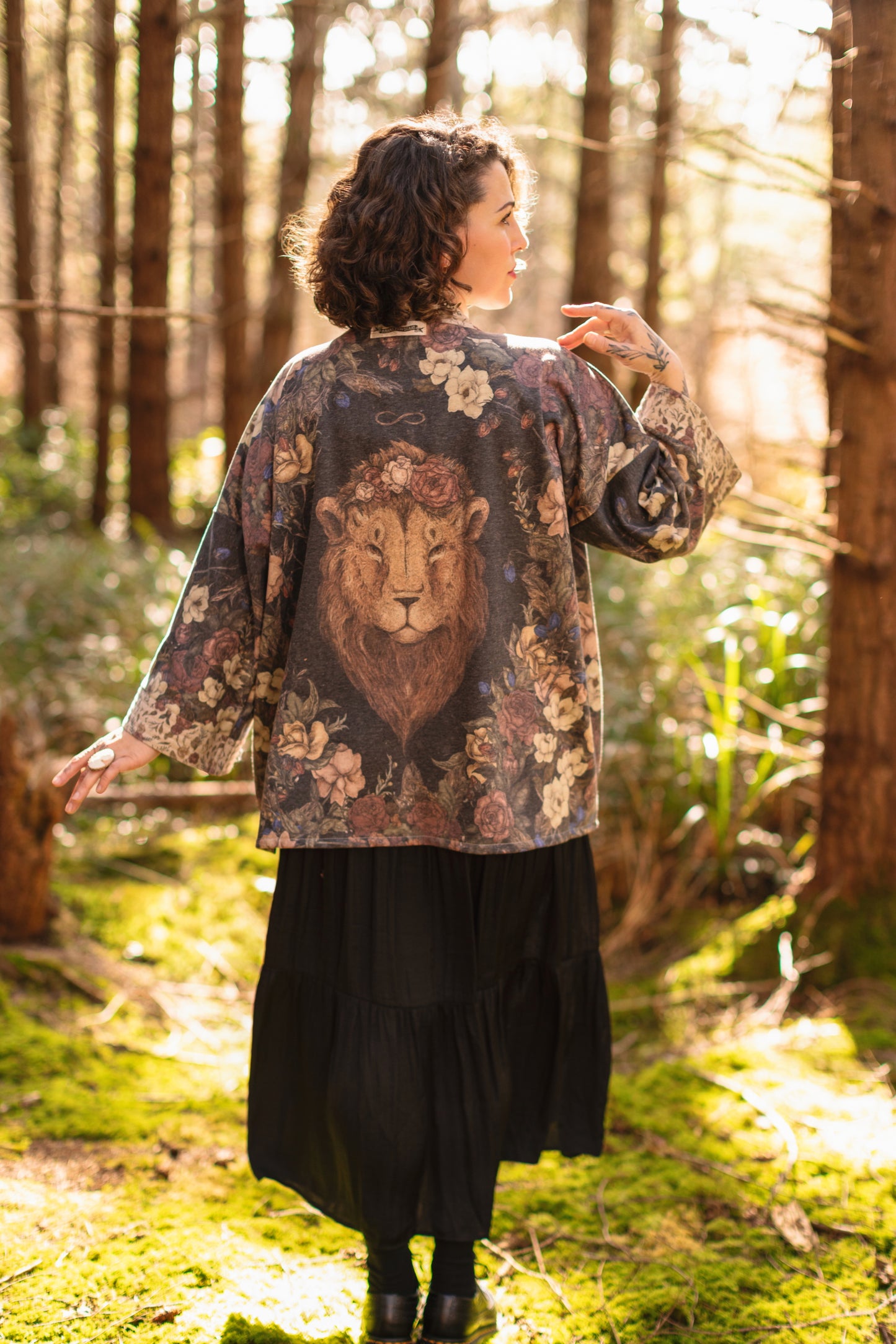 Model wearing the Lionheart Cottage Cardigan ft artwork by illustrator Jessica Roux - Market of Stars