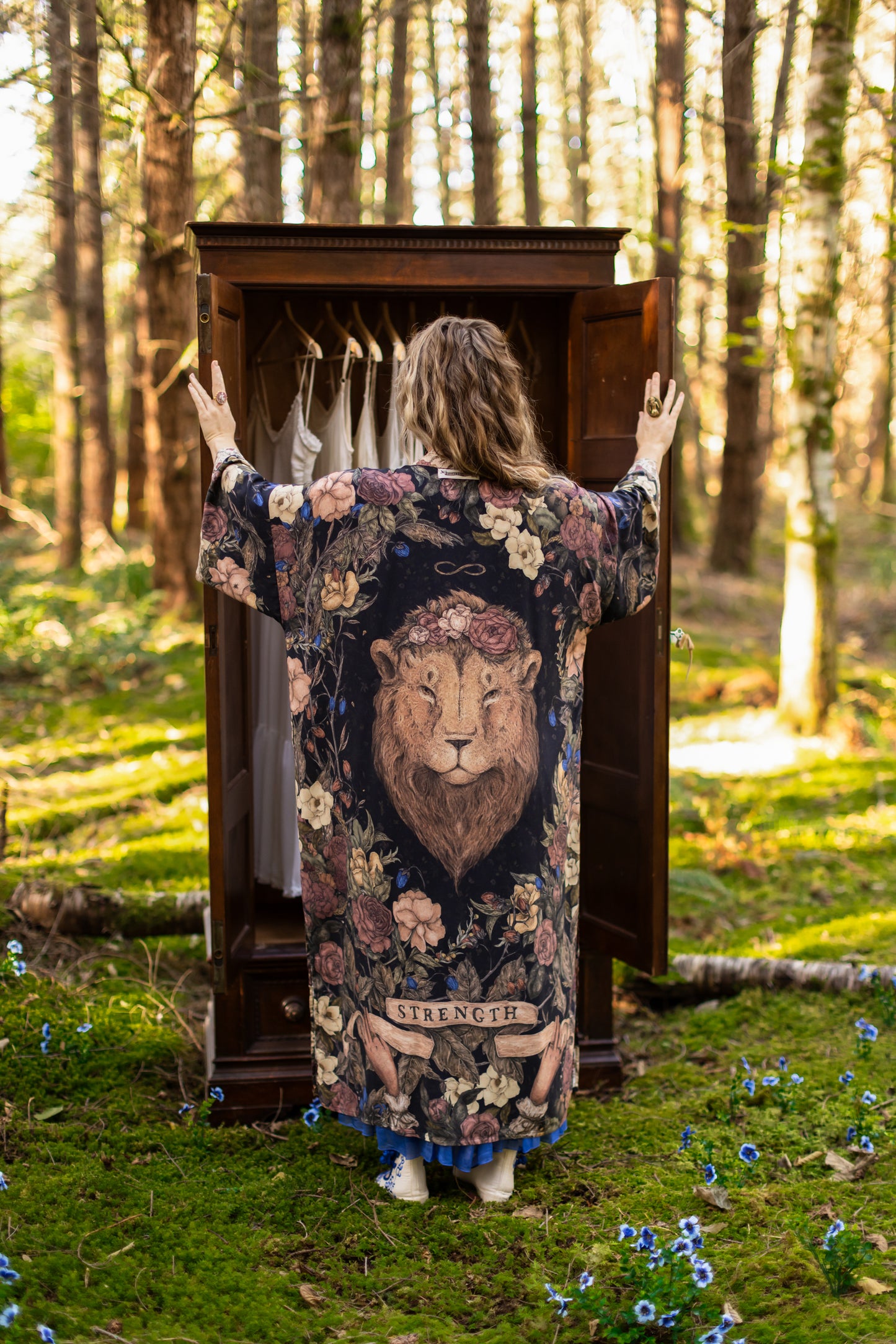 Model wearing a full-length floral duster ft. artwork by artist & illustrator Jessica Roux - Market of Stars