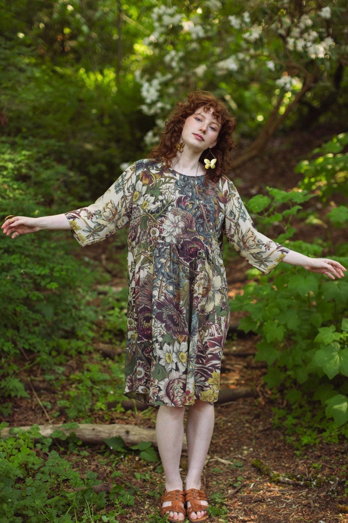 Model styled in Love Grows Wild Artist Dress featuring hand-coloured 1700s floral etchings and bumblebee detail – inspired by the French chemise – Market of Stars