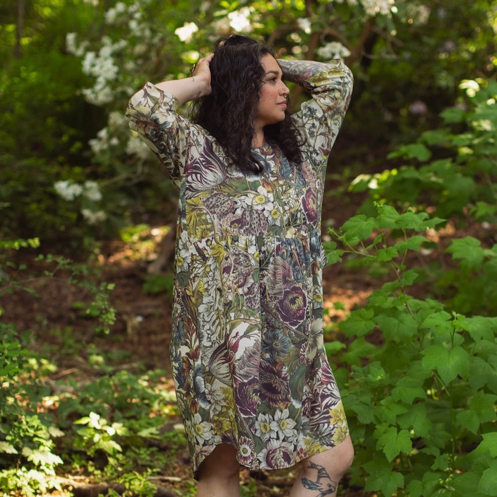 
                  
                    Model styled in Love Grows Wild Artist Dress featuring hand-coloured 1700s floral etchings and bumblebee detail – inspired by the French chemise – Market of Stars
                  
                