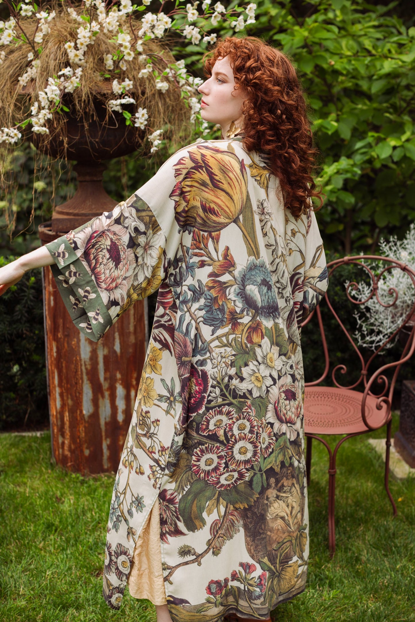 Model wearing kimono featuring 1700s March floral etchings and charming bumblebee trim inspired by vintage seed catalogues – Market of Stars.
