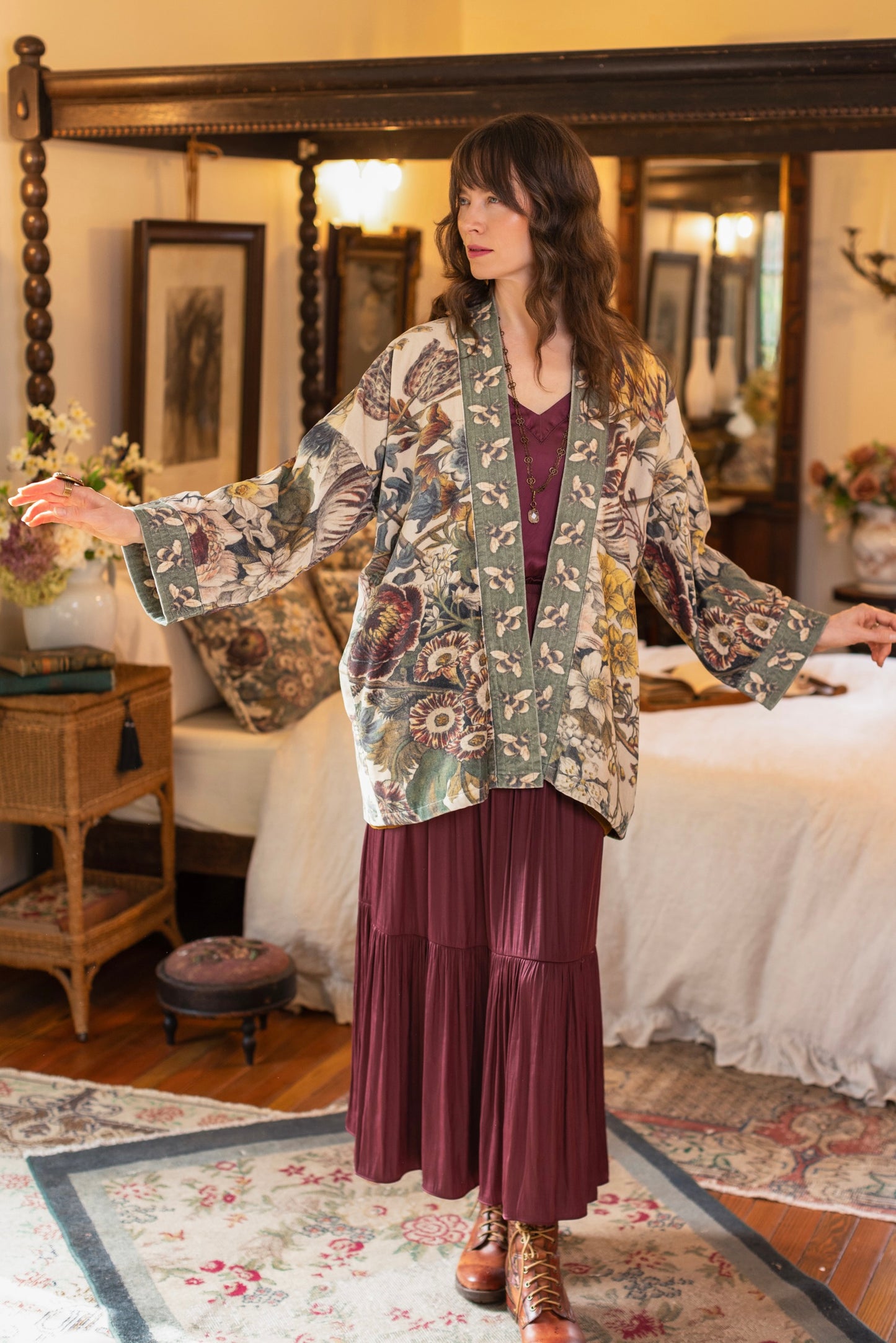 Model wearing a soft cotton velvet duster featuring lush 1700s botanical blooms and bumblebee trim - Market of Stars